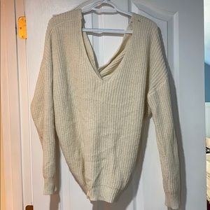 Cream off the shoulder back twist sweater